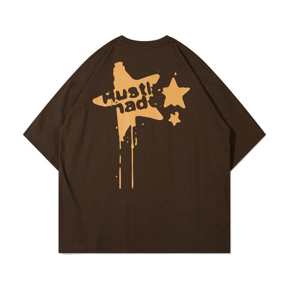 T-shirt avec étoiles et éclaboussures d'encre